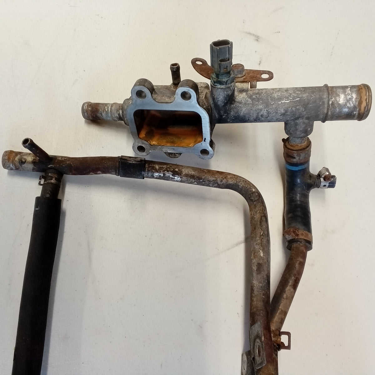 Used Water outlet and Thermostat housing for Mazdaspeed Protege USOB